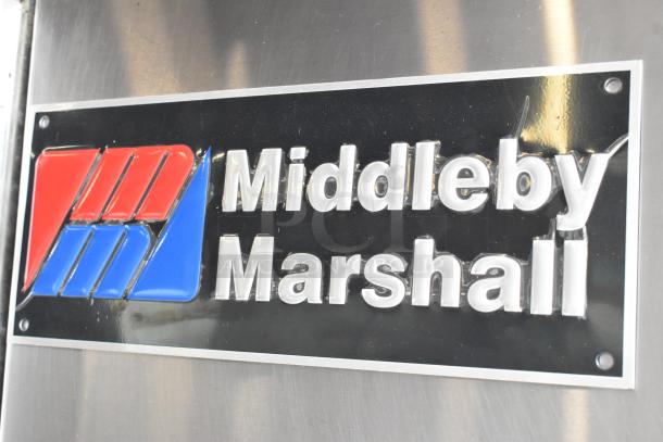 Middleby Marshall PS360 logo on stainless steel, highlighting a commercial natural gas conveyor pizza oven.