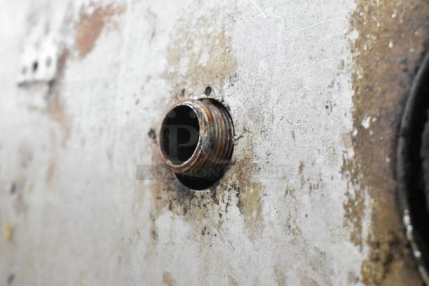 Close-up of a rusted metal fitting on a Middleby Marshall PS360 commercial pizza oven. Visible wear suggests used condition.