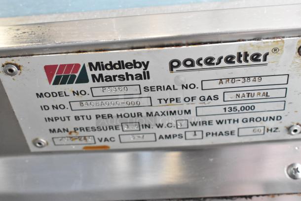 2 Middleby Marshall PS360 stainless steel conveyor pizza ovens, natural gas, 135,000 BTU, on casters. Model PS360 plate visible.