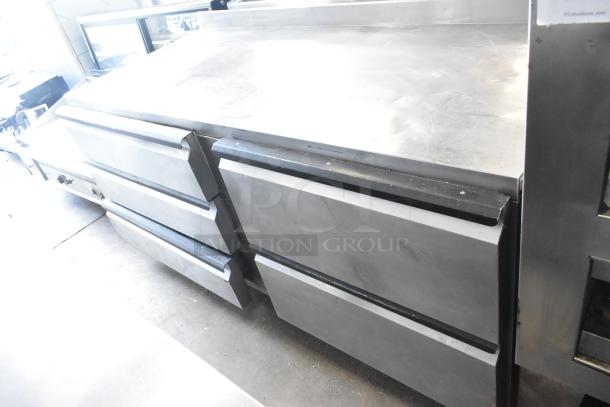 Silver King SKF72D stainless steel 5-drawer work top freezer, 115 volts, 1 phase, used condition, visible surface wear.