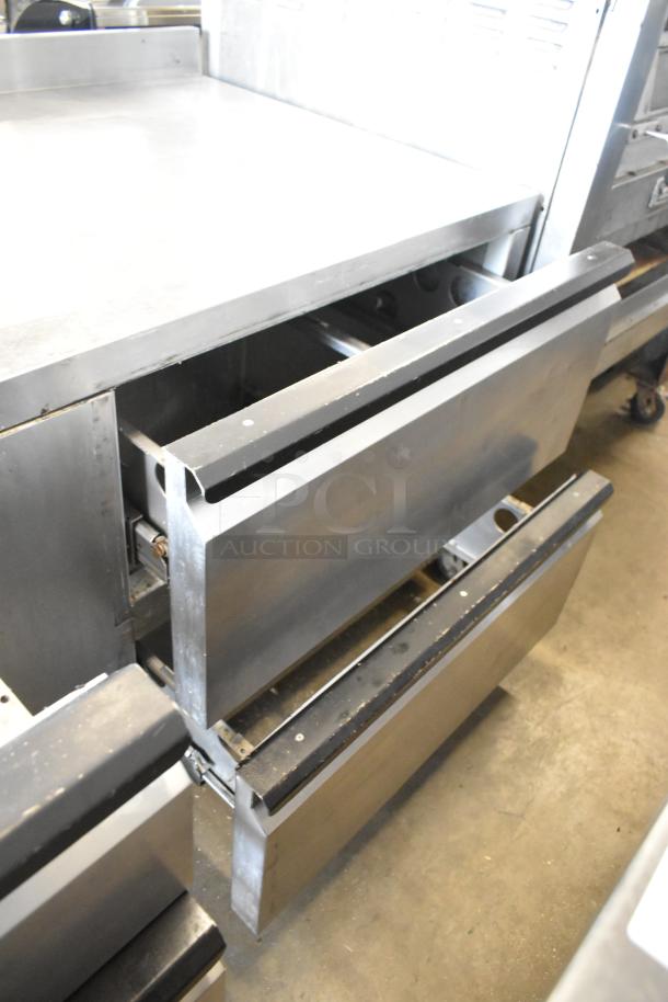Silver King SKF72D stainless steel 5-drawer worktop freezer. Commercial-grade, 115 volts, 1 phase. Open drawer view.