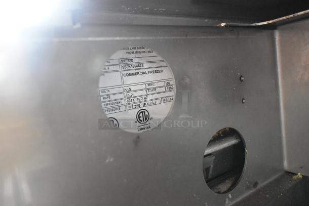 Silver King SKF72D stainless steel commercial freezer label showing model, volts, amps, and refrigerant details.