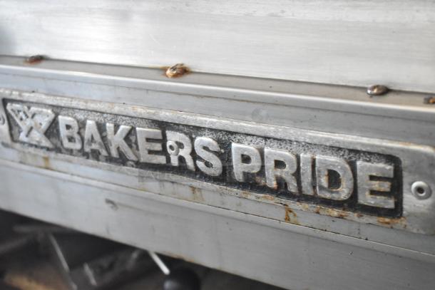 Bakers Pride EP-2-2828 SuperDeck pizza oven, stainless steel, 2 decks, on metal legs, needs lower door reattached.