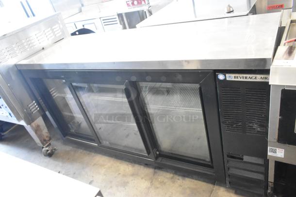 Beverage Air BB72HC-1-GS-B-27 commercial 3-door glass cooler, black metal, 115V, clean with minor wear.
