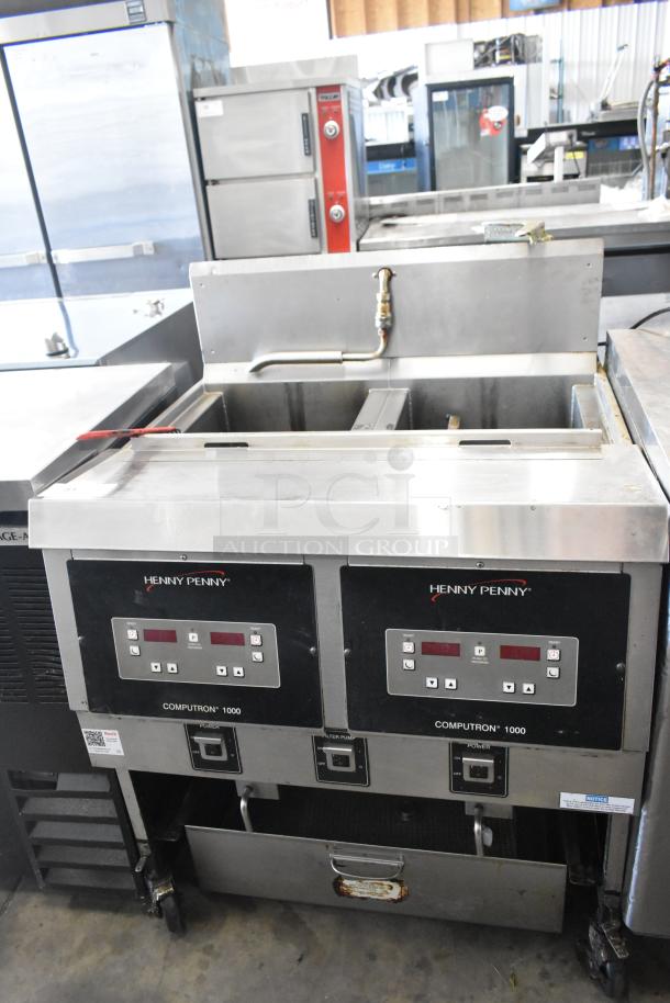 2019 Henny Penny OFG-322 Computron 1000 stainless steel 2-bay deep fryer on casters, 170,000 BTU, natural gas powered.