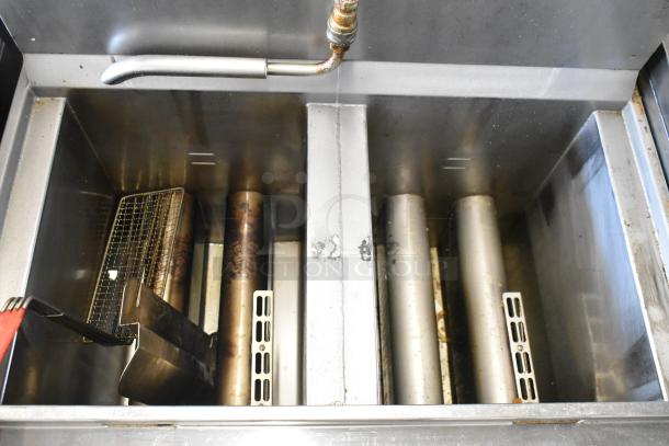 2019 Henny Penny OFG-322 Computron 1000 2 bay deep fat fryer, stainless steel; natural gas, commercial casters.