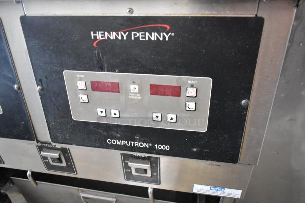 2019 Henny Penny OFG-322 Computron 1000, stainless steel, natural gas 2-bay fryer, 170,000 BTU, on commercial casters.