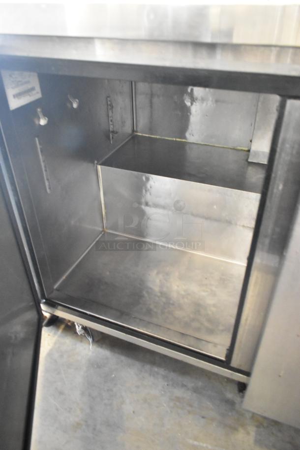 Migali C-U72R stainless steel 3-door undercounter cooler on casters, interior view, 115 volts, 1 phase, commercial use.