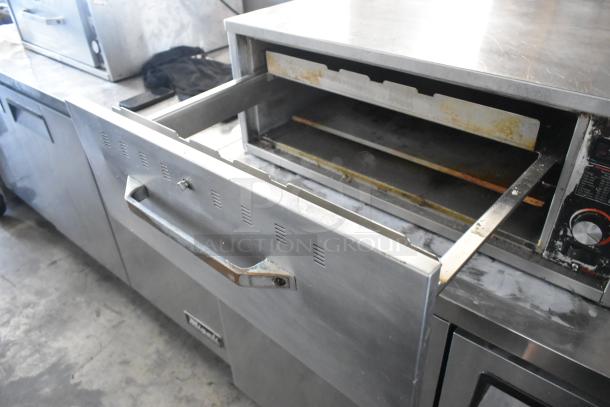 Hatco stainless steel commercial single drawer warming drawer, open, showing interior. 115 volts, 1 phase, handle visible.