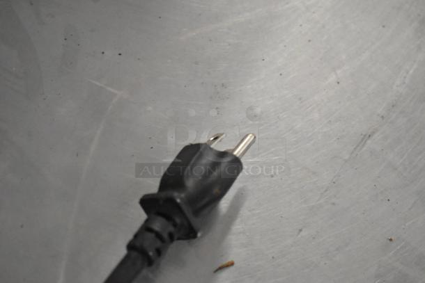 Plug of Hatco Stainless Steel Commercial Single Drawer Warming Drawer, 115 Volts, 1 Phase, on metal surface.