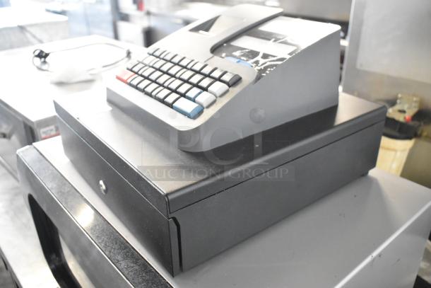 Royal 520DX electronic cash register, countertop model, 120V, 1 phase. Shows keypad and cash drawer, good condition.