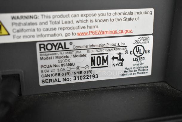 Royal 520DX Cash Register label, showing model 520DX, 120V, 1 Phase. Markings include UL certification and serial number 31022193.