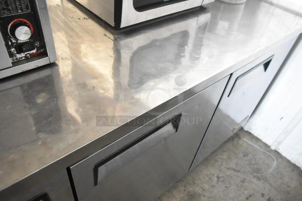Migali C-U72R stainless steel 3-door undercounter cooler on casters, 115V, 1 Phase. Clean surface, good condition.