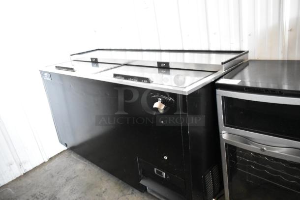 Arctic Air AUB65RZ commercial back bar bottle cooler, metal with two sliding lids on casters, 115V, 1 phase.