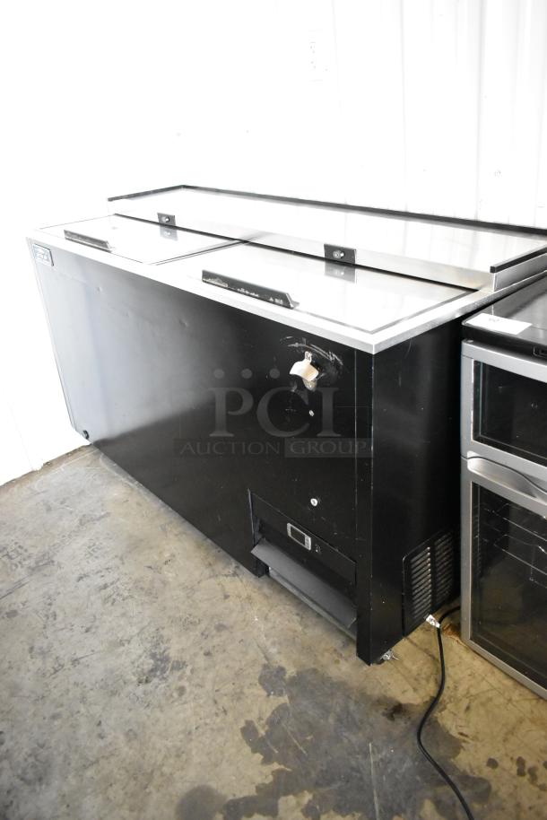 Arctic Air AUB65RZ commercial back bar bottle cooler with 2 sliding lids on casters, in black metal, 115 volts, 1 phase.