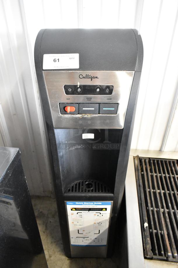 Culligan BAEMUV1SHSK-DU100 water cooler, 115V, 1 phase, with temperature controls and startup guide visible. Suitable condition.