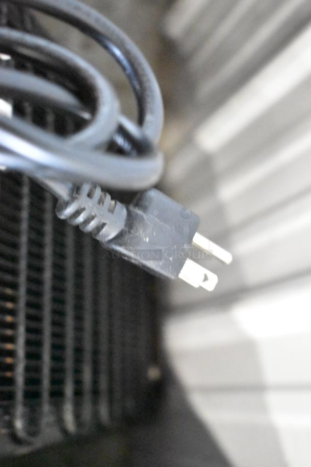 Culligan BAEMUV1SHSK-DU100 Water Cooler, 115V, 1 Phase. Close-up of power cord plug.