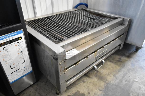 Attias stainless steel commercial gas charbroiler grill, countertop model, visible markings, moderate wear.