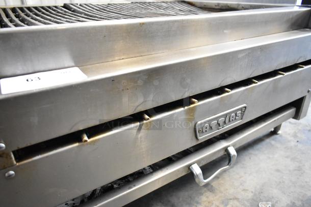 Attias stainless steel commercial countertop gas charbroiler grill, used condition, with visible brand logo and control panel.