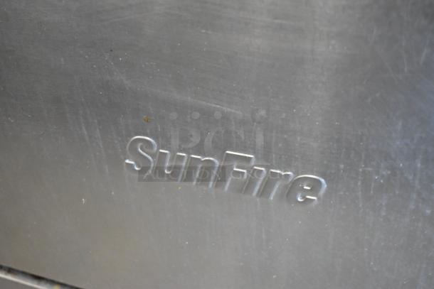 Garland SunFire stainless steel commercial range, featuring embossed "SunFire" label, highlighting durability and quality.
