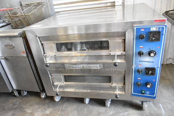 Bakers Pride EP-2-2828 SuperDeck stainless steel 2-deck pizza oven, broken cooking stones, 208V, 1 phase.