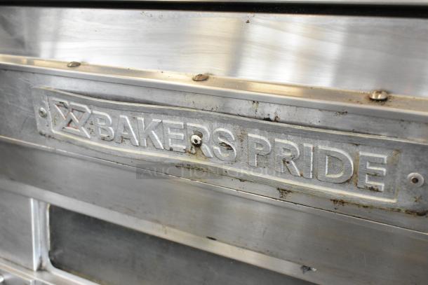 2021 Bakers Pride EP-2-2828 stainless steel pizza oven, 2 decks, visible wear, broken stones, 208V, 1 phase.