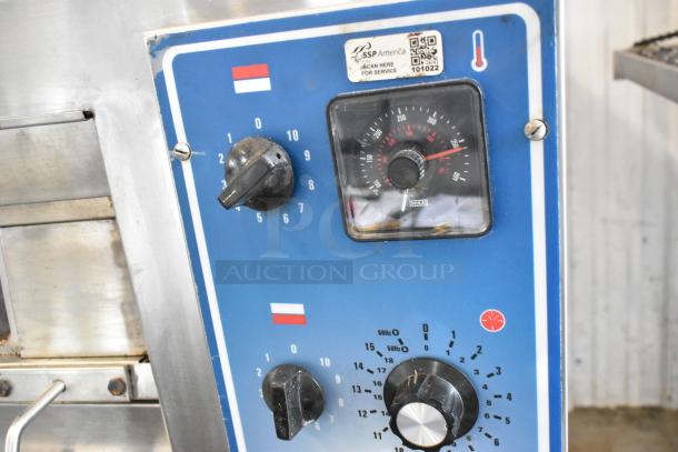 2021 Bakers Pride EP-2-2828 SuperDeck pizza oven, stainless steel, with broken cooking stones, control panel shown.