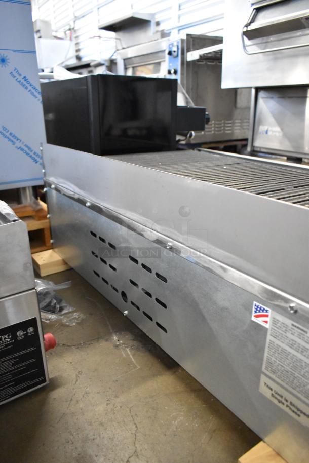 EmberGlo Stainless Steel Commercial Countertop Charbroiler Grill, excellent condition, vented panel, USA-made label visible.