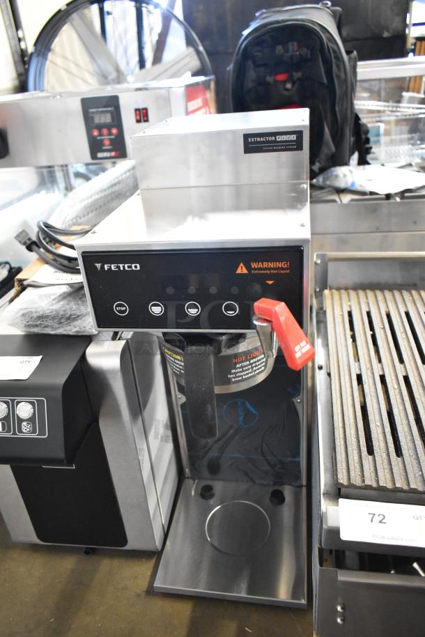 Fetco CBS-1221 Stainless Steel Commercial Coffee Machine with Hot Water Dispenser and Metal Brew Basket.