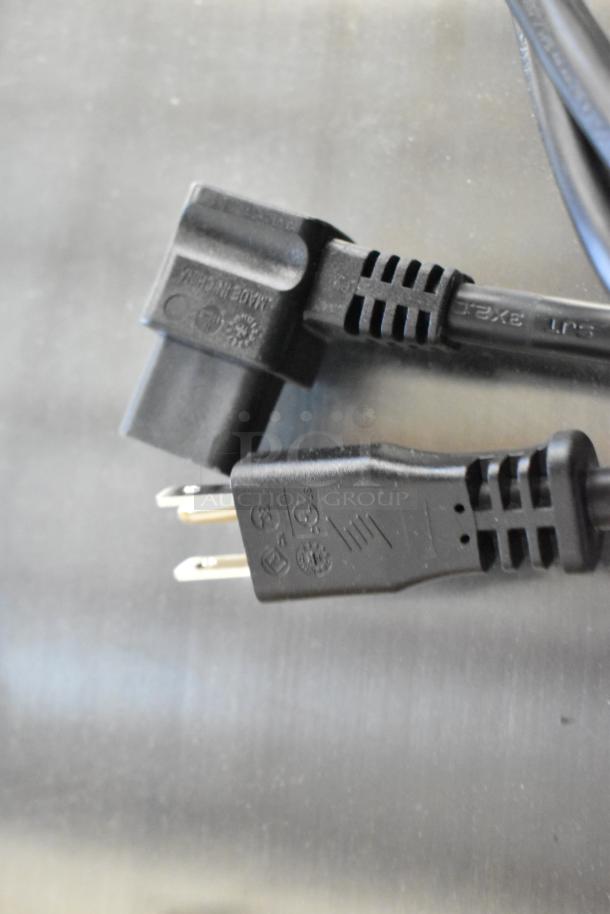 Close-up of power cord plugs for Narvon 23BCWD8 water dispenser, 120 volts, 1 phase. Made in China marking visible.