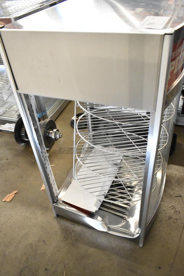 Brand new ServIt 423PDW12D1 stainless steel 12" pizza warmer with 4-shelf rotating rack, scratch and dent condition.