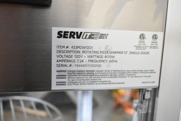 Brand new ServIt 423PDW12D1 pizza warmer label, 120V, 800W, 4-shelf rotating rack, scratch and dent condition.