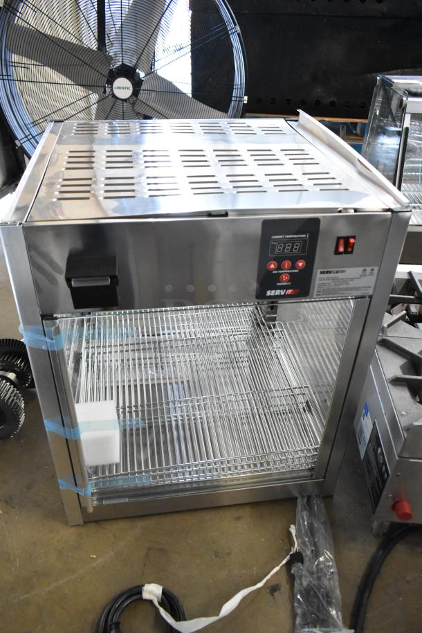 Brand new ServIt 423PDW18D2S stainless steel display warmer, 18", four shelves, digital control panel, 120V, 1 phase.