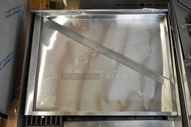 Brand new Cooking Performance Group 351CRCPG24NL stainless steel 24" gas charbroiler, scratch and dent, missing grates.