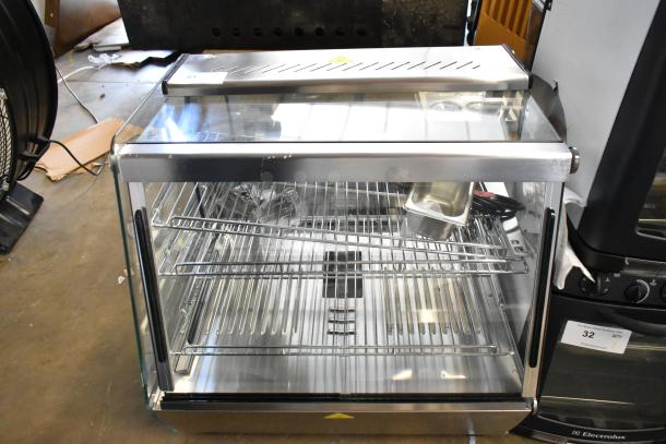 ServIt 423HDM26SA stainless steel heated display case, 26", 3 shelves, broken glass, missing rear doors, 120V, 1 phase.
