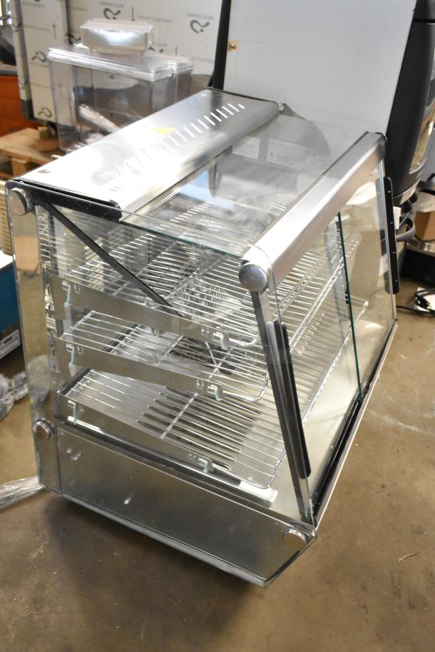 Brand new ServIt 423HDM26SA stainless steel 26" heated display case, 3 shelves, broken glass, missing rear doors, 120V.