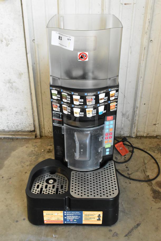 Taylor X83684-12 metal commercial frozen beverage mixing machine, features drink selection panel, good condition.