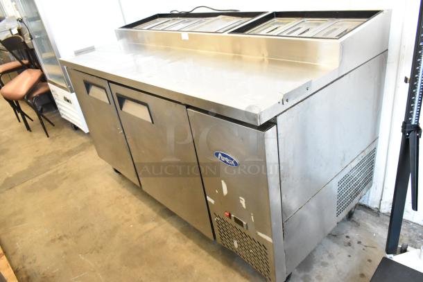 2018 Atosa MPF8202GR stainless steel pizza prep table, commercial casters, 115V, 1 Phase, good condition.