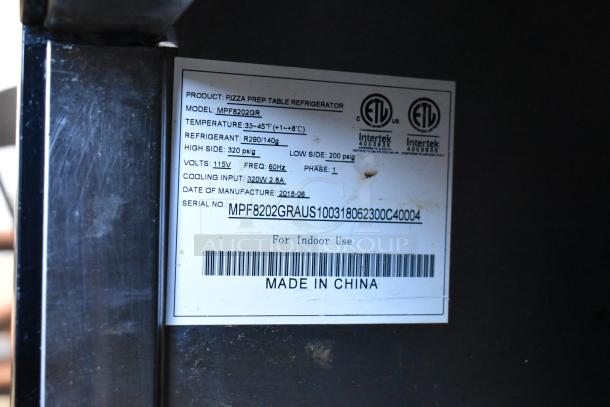 2018 Atosa MPF8202GR stainless steel pizza prep table label shows model, specs, refrigerant type, and manufacturing details.