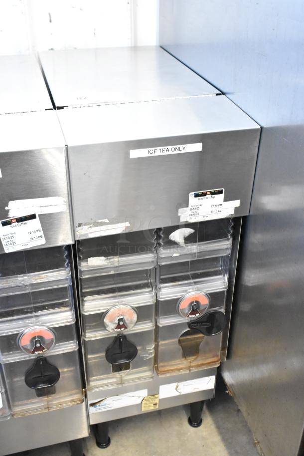 Bunn ICDD-3 Stainless Steel Reservoir Stand, featuring multiple compartments and spigots. Labels indicate "ICE TEA ONLY." Good condition.