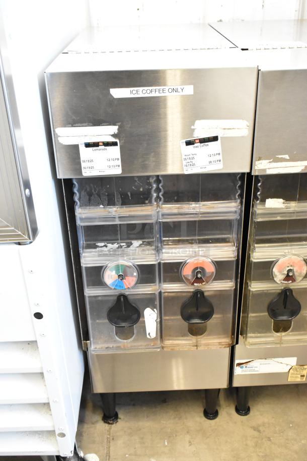 Bunn ICDD-3 stainless steel reservoir stand with labeled compartments for iced coffee and lemonade, showing signs of use.