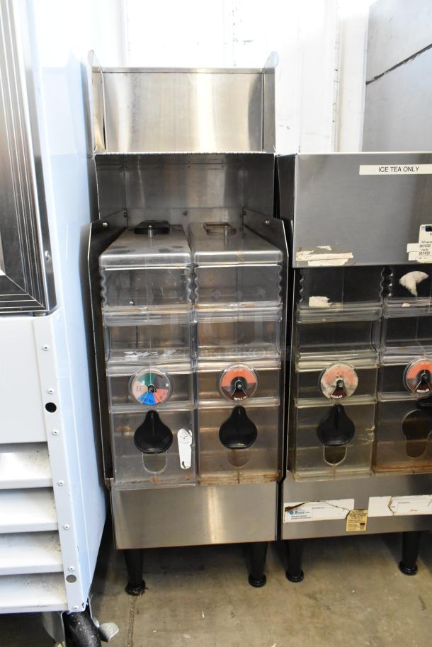 Bunn ICDD-3 stainless steel reservoir stand, dual dispensers, visible wear, ideal for commercial beverage services.