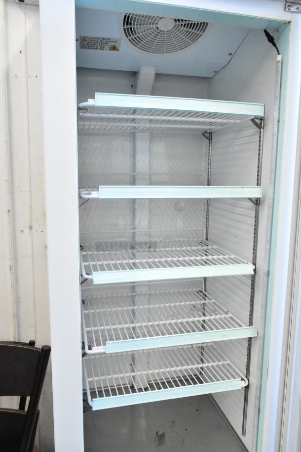 2022 Avantco 178GDC12FHCW commercial cooler with single glass door, poly-coated racks, and commercial casters. 115V, 1 phase.