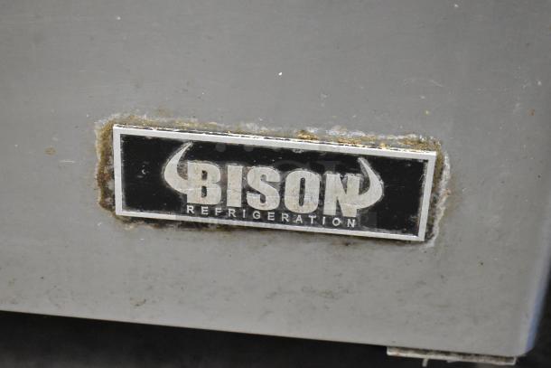 Bison MGF8402 stainless steel commercial undercounter cooler with visible logo. Features two doors and commercial casters.