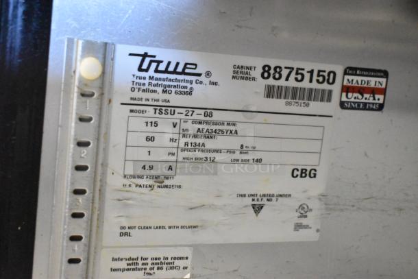 True TSSU-27-08 label showing model and specifications, 115V, 1 Phase, R134A refrigerant, made in the USA.