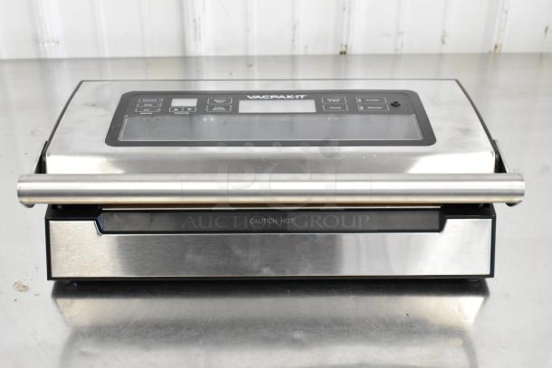 2024 VacPak-It 186VSM12PRO Vacuum Sealer, 12" seal bar, cutter, roll holder, stainless steel, "Caution: Hot" label.