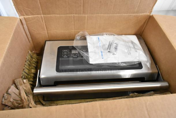 2024 VacPak-It 186VSM12PRO external vacuum sealer, new in box, featuring 12" seal bar, cutter, and roll holder.
