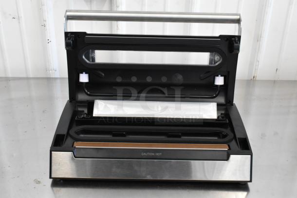 2024 VacPak-It 186VSM12PRO external vacuum sealer with 12" seal bar, cutter, roll holder, "Caution: Hot" label.