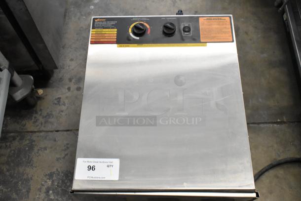 Weston stainless steel countertop dehydrator, 120 volts, 1 phase. Features temperature controls and power switch.
