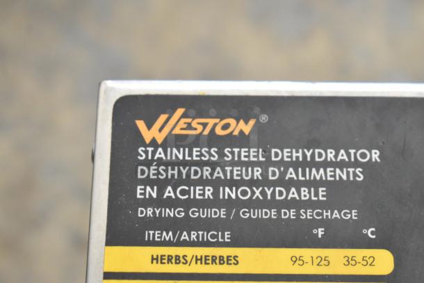 Weston Stainless Steel Countertop Dehydrator with drying guide label, 120 Volts, 1 Phase, in good condition.